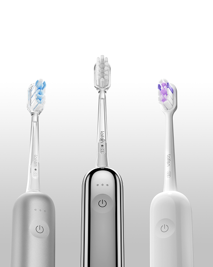 Электрическая зубная щетка